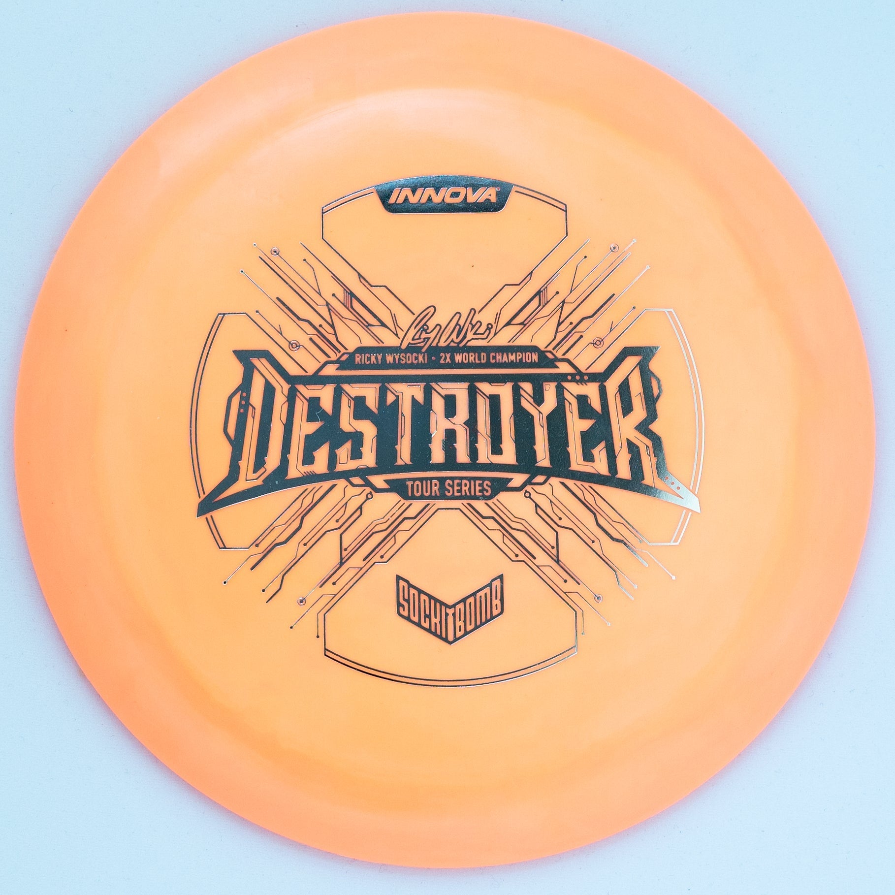 Orange 2021 Ricky Wysocki Tour Series 'SockiBomb' Destroyer disc golf distance driver by Innova Champion Discs.