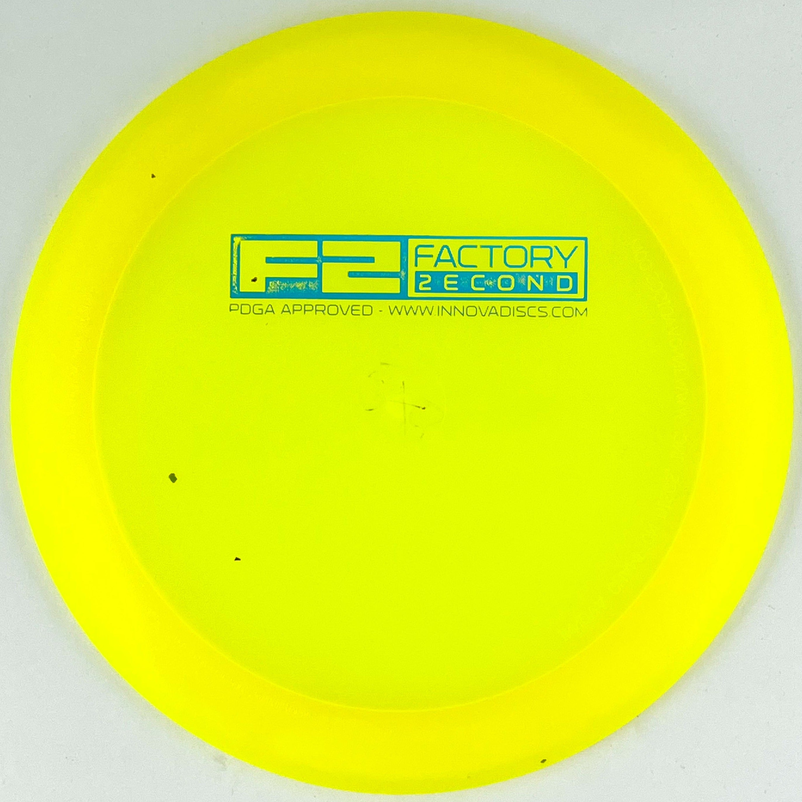 Yellow Champion Destroyer disc golf distance driver by Innova Champion Discs.
