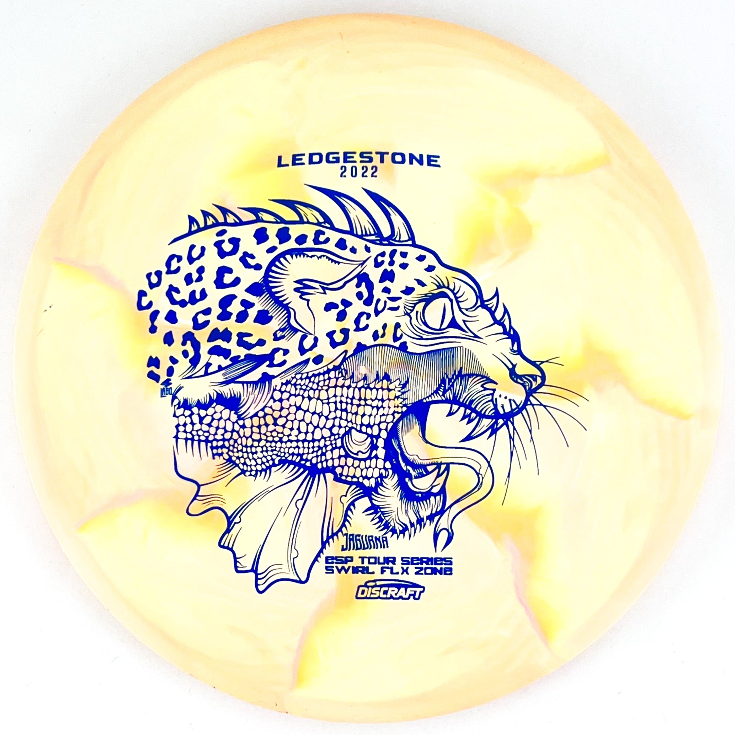 Yellow 2022 Ledgestone Tour Series ESP Swirl Flx Jaguana Zone disc golf putt and approach disc from Discraft Disc Golf.